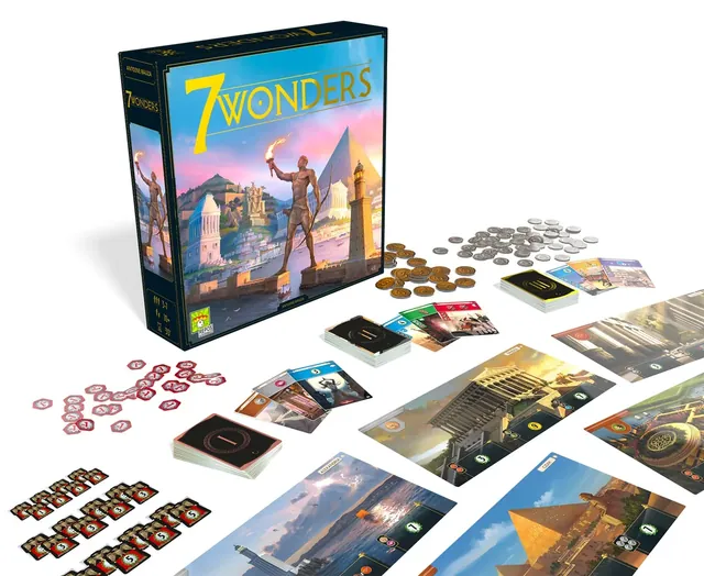 The box with coins, military tokens and cards spread out in front of it