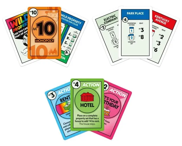 Monopoly Deal cards spread out: money, property, rent and action cards