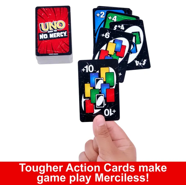A hand holding up a Wild Draw 10 card beside the No Mercy deck and a fan of draw cards (Mattel graphic)