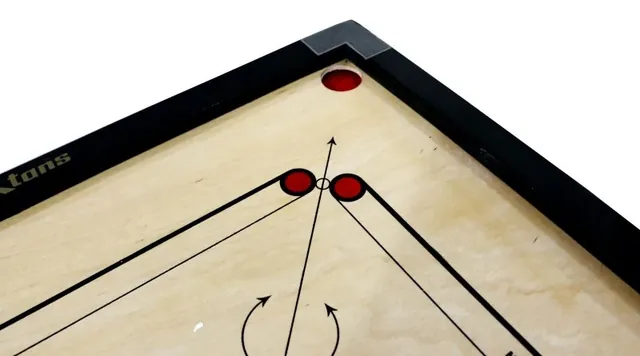 A corner of the Koxtons board: the cut pocket and the black hardwood border