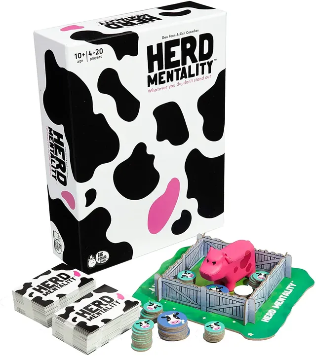 The Herd Mentality box with its question cards, cow tokens, cardboard paddock and the squishy pink cow