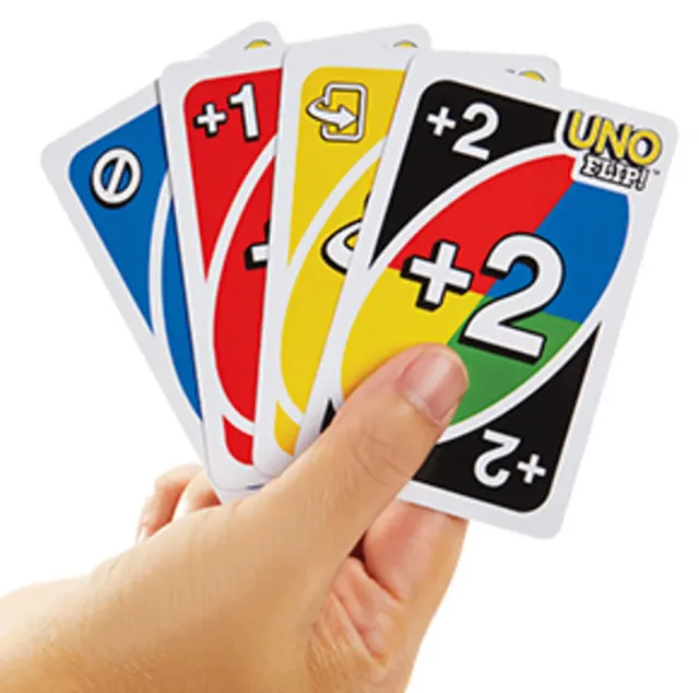 A hand holding Light Side cards, including +1 and +2 cards