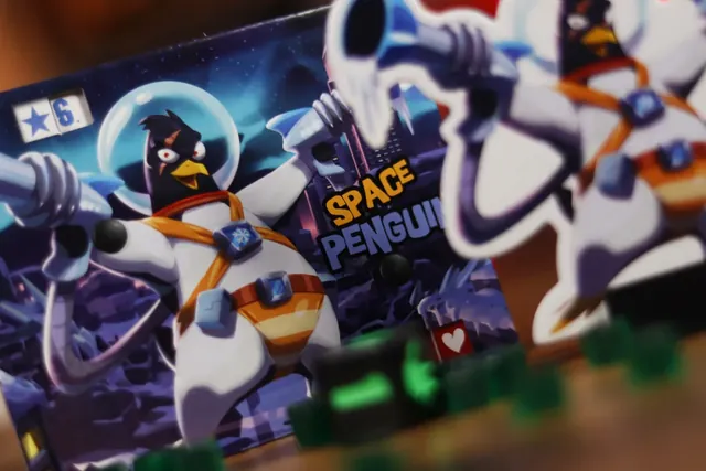 The Space Penguin monster board with its figure