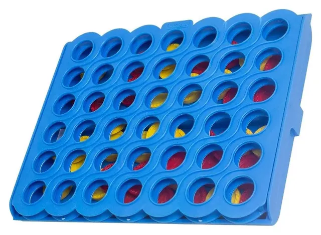The blue Strike 4 grid, angled, with red and yellow discs in some of its slots