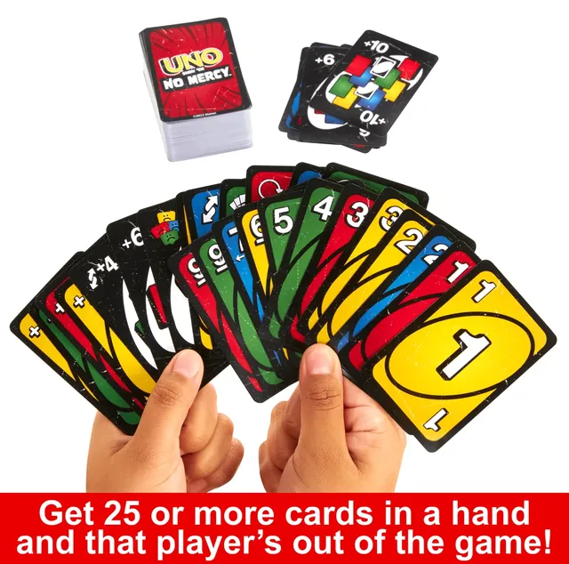 Two hands holding a huge fan of No Mercy cards (Mattel graphic)