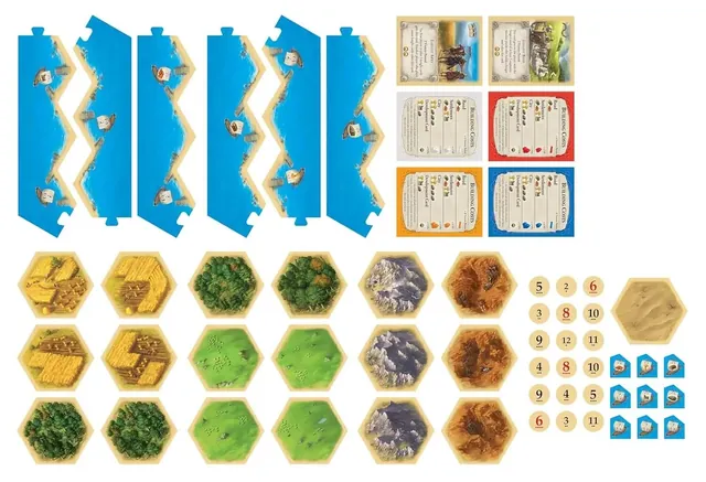 The cardboard parts before setup: six blue sea frame pieces, nineteen terrain hexes, eighteen round number tokens, nine small harbour pieces and the building-cost and bonus cards