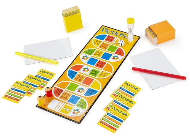 The long Pictionary board strip with card boxes, sand timer, sketch pads and pencil